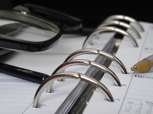 productivity planning session with calendar planner and task management tools on organized desk